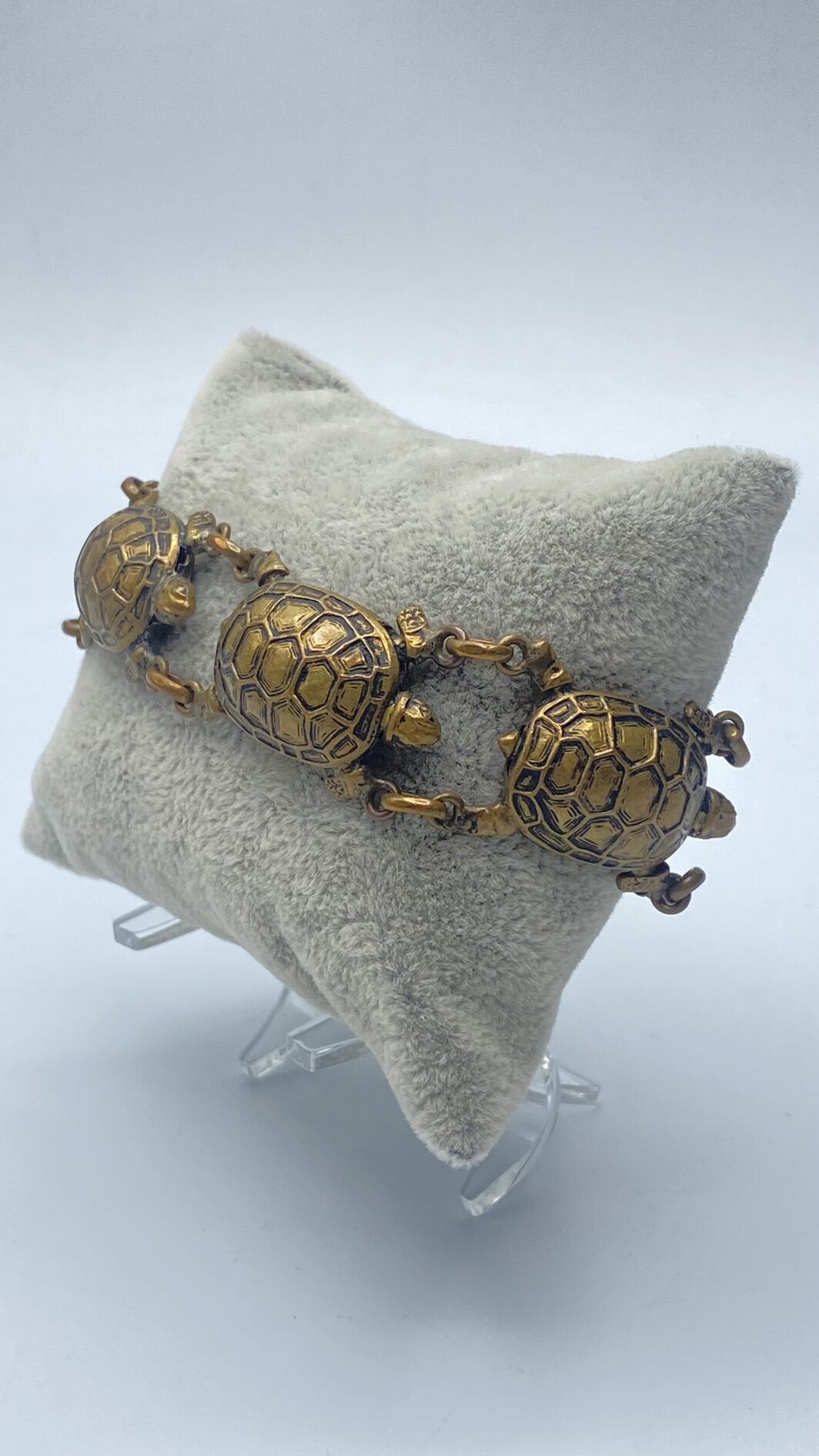BRACCIALE VINTAGE CON TARTARUGHE, IN METALLO DORATO. ITALIA, PRIMA METÀ DEL XX sec.
