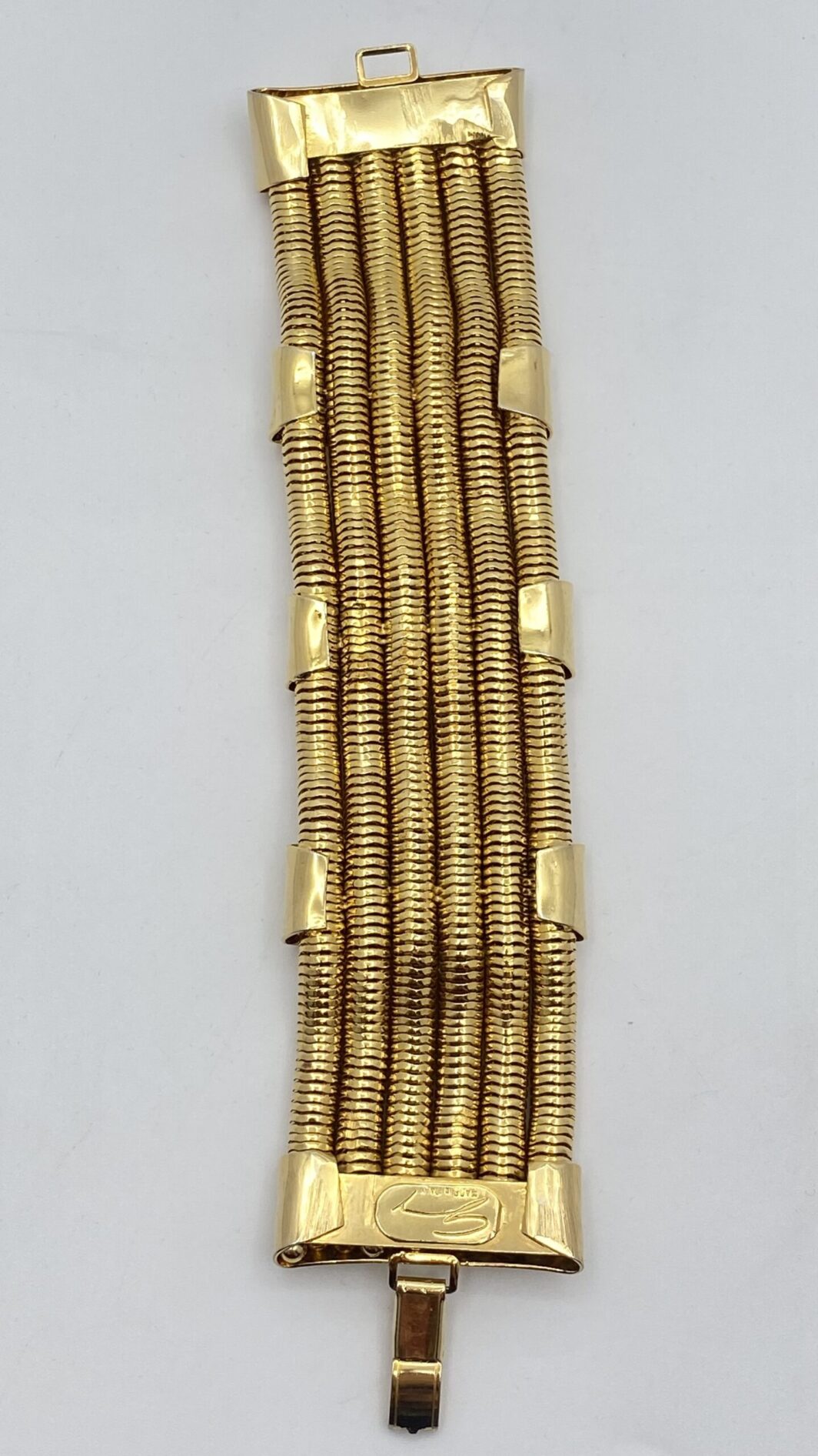 “GENNY” VINTAGE. BRACCIALE SEMIRIGIDO A POLSIERA IN METALLO GOLDTONE. - immagine 9