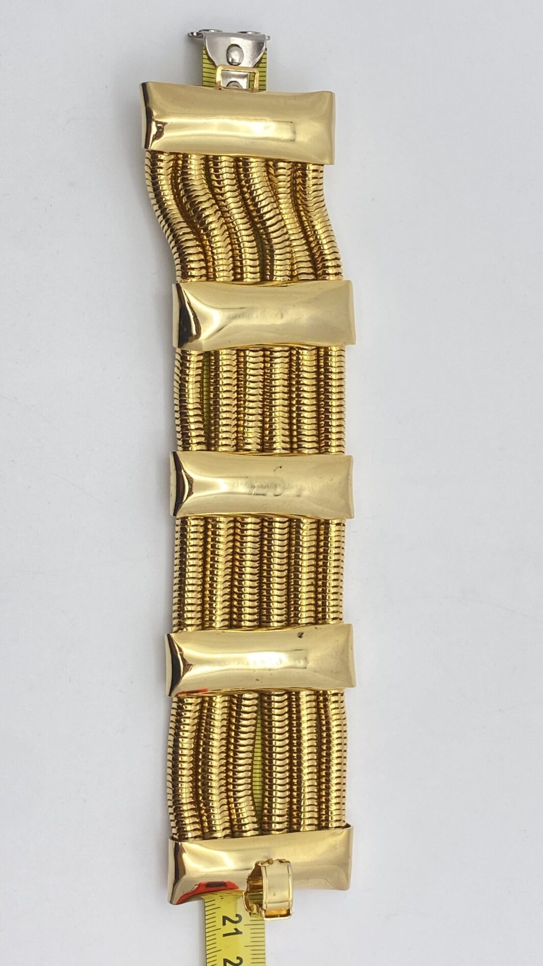 “GENNY” VINTAGE. BRACCIALE SEMIRIGIDO A POLSIERA IN METALLO GOLDTONE. - immagine 11
