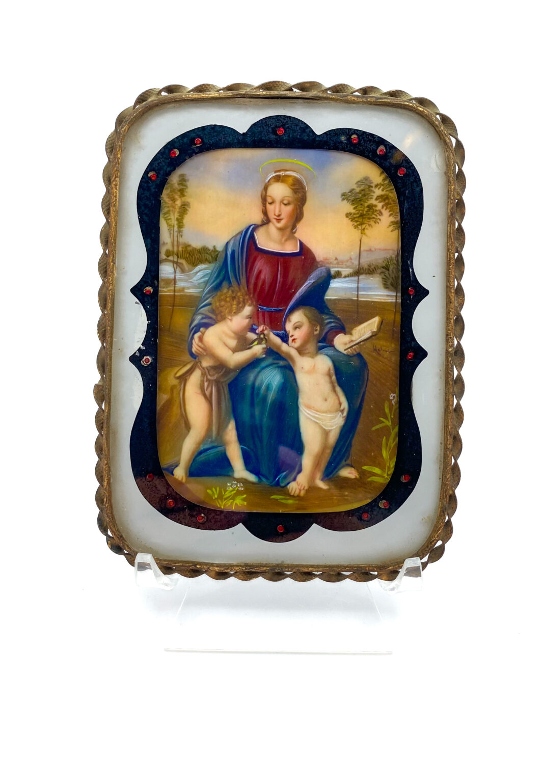 STRAORDINARIA MINIATURA SU AVORIO RAFFIGURANTE IL SUBLIME DIPINTO DELLA “MADONNA DEL CARDELINO” DEL CELEBRE MAESTRO ITALIANO RAFFAELLO SANZIO, CON RAFFINATA CORNICE IN VETRO DIPINTO E ORMOLU FINEMENTE SAGOMATO. ITALIA, SECONDA METÀ O FINE DEL XIX sec.