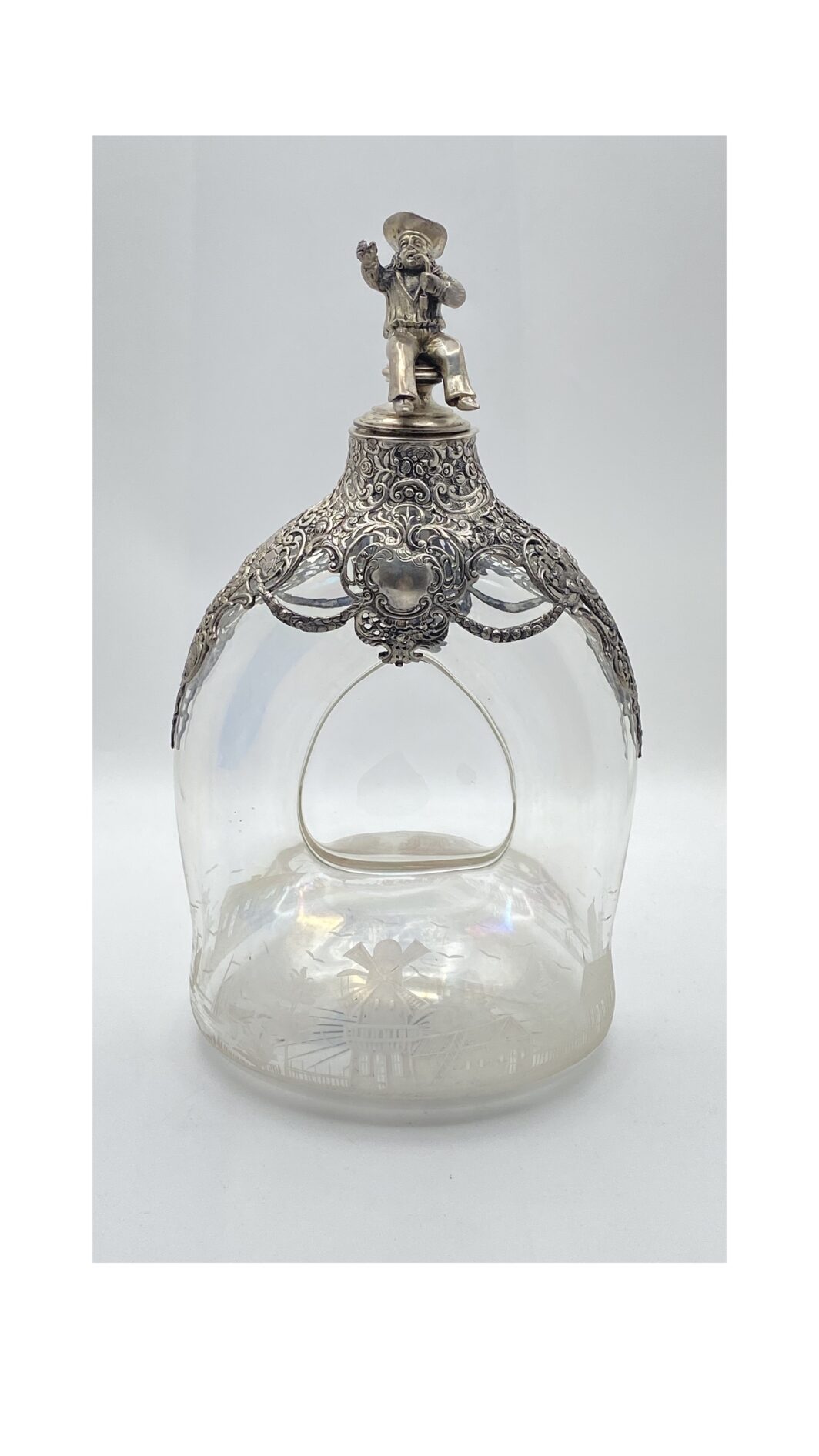 BOTTIGLIA DA LIQUORE IN CRISTALLO INTAGLIATO E ARGENTO, GERMANIA XIX SECOLO, RAFFINATA OPERA DECORATIVA DAL FASCINO CONTADINO